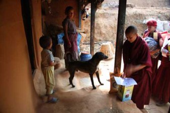 april 09 giving goods to families in nepal